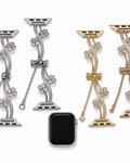 Silver, gold, and rose-tone floral vine watch bands with clear stone-inspired accents and dangling chains.